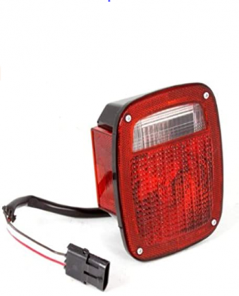 Omix-Ada 12403.11 Left Hand Tail Light with Black Housing for Jeep Wrangler YJ
